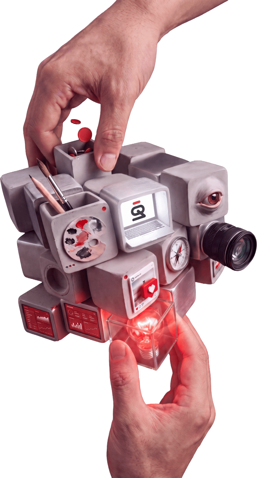 An evolved cube of instruments, lenses and gauges held between two hands